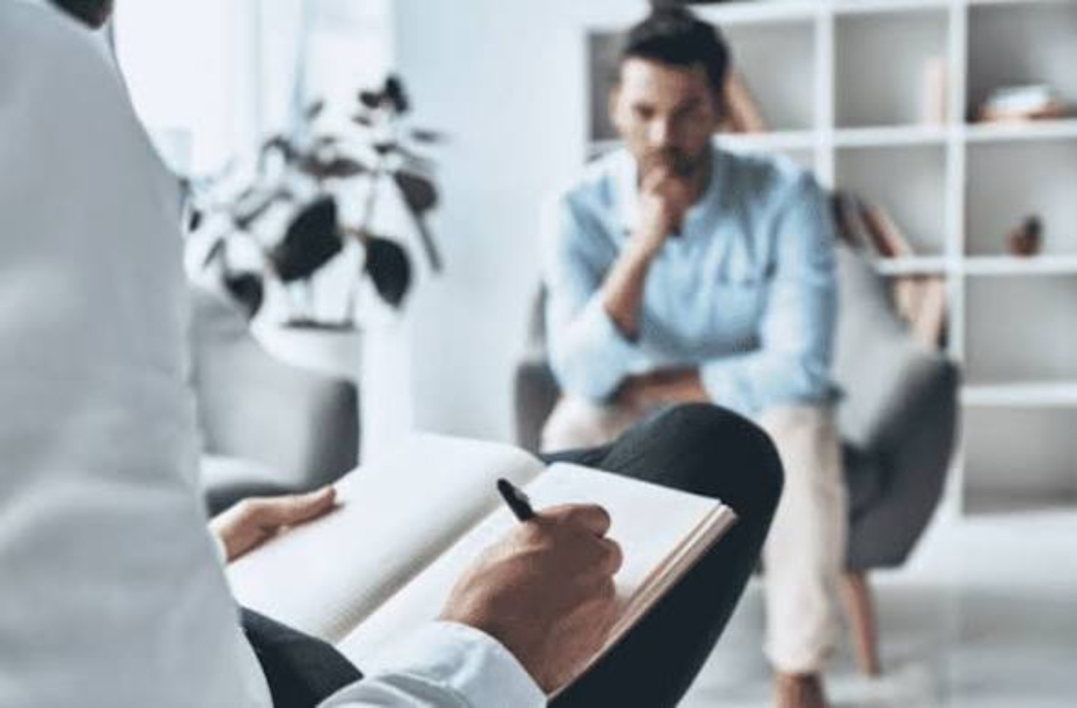 Therapist meeting privately with an individual client